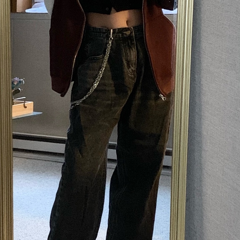 baggy black high rise jeans. straight legs.